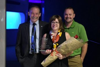 Bob Price, Jeanie Price and Brad Hoffman as Price wins ACE award at CPA FMA.