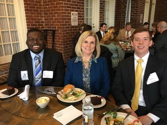Theo Sutton, tax intern, Christine Aspell, Managing Partner, and Sean Ryan, audit intern, KPMG